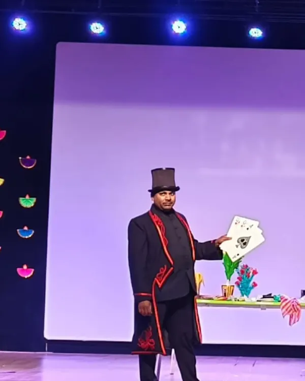 A classic card trick, but made for the stage. This illusion is perfect for engaging a large audience during a formal corporate show or annual day celebration.