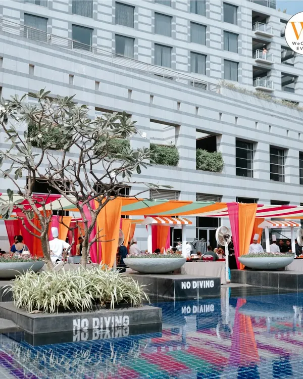 A vibrant poolside Mehendi at the Grand Hyatt Mumbai, where we used colorful drapes and comfortable seating to create a festive, relaxed atmosphere.