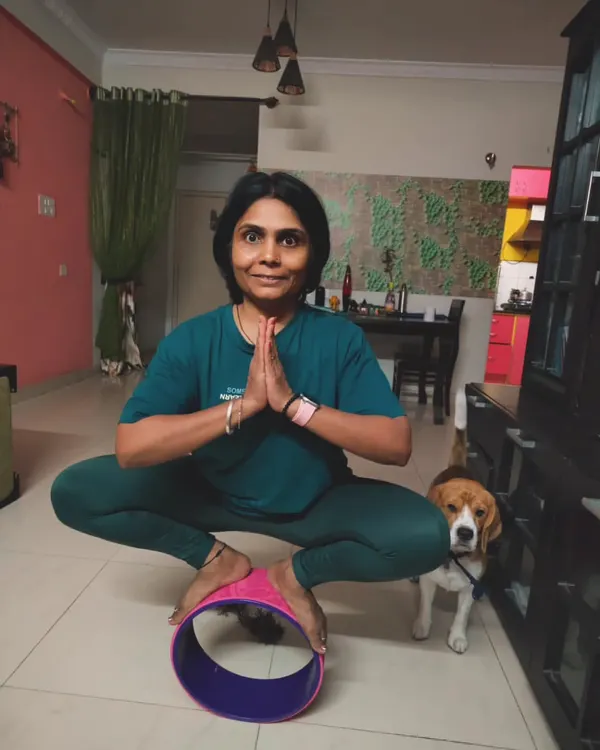 Balancing life, sometimes with a little help from my beagle. Here I am practicing my balance on a yoga wheel. It's a reminder that practice is a journey, not a destination.