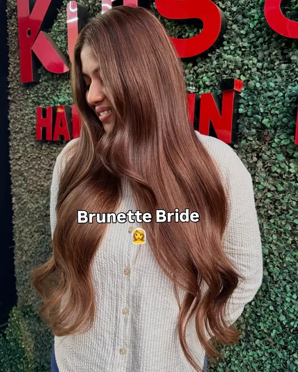 Presenting our beautiful brunette bride. She is ready for her wedding festivities with this gorgeous, rich hair color that we created just for her.