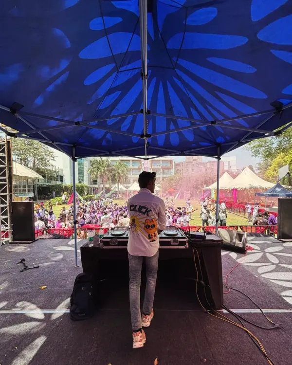 The hype for the UCB Holi festival was real. A view from my stage, looking out at the massive crowd ready for a day of music and color.