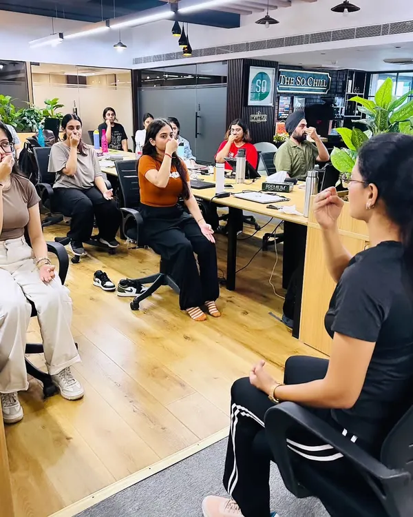 I guide teams through simple yet powerful breathwork exercises like Anulom Vilom right in the office. This technique is excellent for calming the mind, improving focus, and reducing stress during a busy workday.