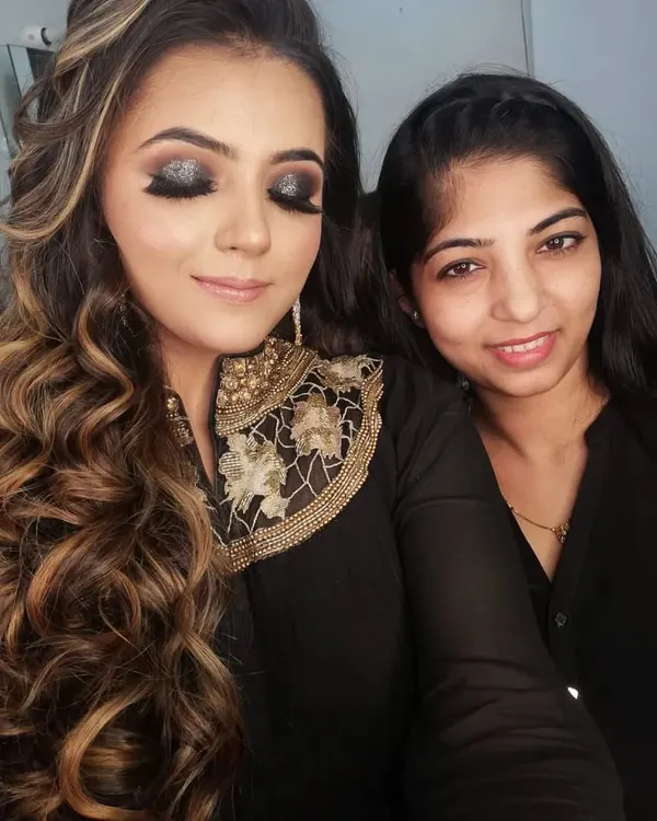 A glamorous black smokey eye with glitter, a popular look for parties and events that I teach in my advanced classes.