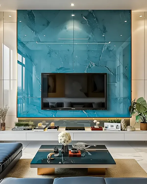 This is a great example of how I create a stunning focal point in a living room. I designed this floating TV console and paired it with a dramatic, bookmatched blue marble-style backdrop, complete with integrated backlighting to create a luxurious and modern entertainment space.