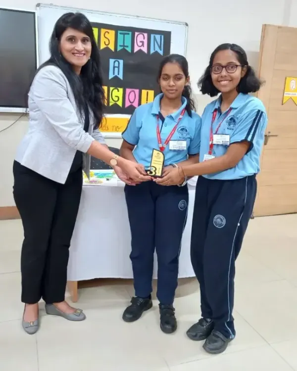 It was an honor to be a judge at this inter-school logo design competition. Here I am presenting an award to the talented winners.