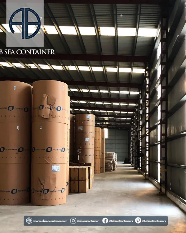 An interior view of my warehousing service, where large paper rolls are stored safely. I offer top-tier facilities designed to protect valuable and sensitive goods from environmental factors.