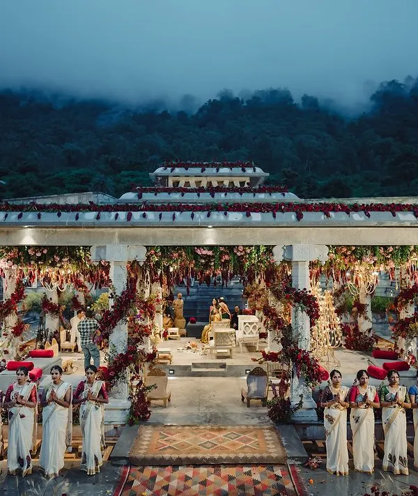 This is what we dream of: a breathtaking ceremony at the foothills of Nandi Hills. We designed this space to feel both grand and intimate, letting the misty mountains serve as the ultimate backdrop for a traditional Bunt ceremony. The scale of the venue is matched only by the opulence of the floral design.