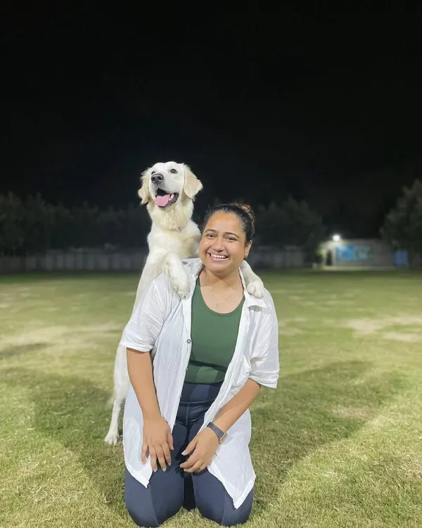 Your friendly neighborhood canine trainer, saying hello from Noida! This is me in my element, happy and ready for a day of training in the park.