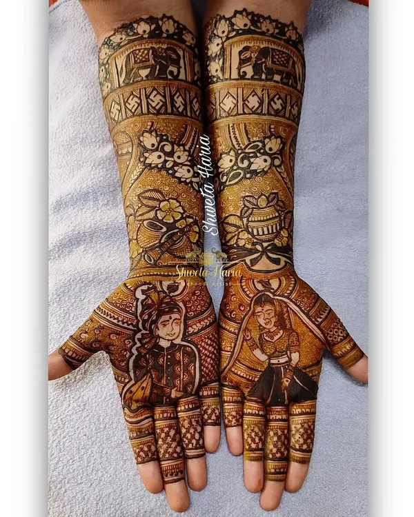 This full bridal mehendi tells a story, featuring portraits of the bride and groom, the gathbandhan ritual, and auspicious symbols like the kalash and elephants.