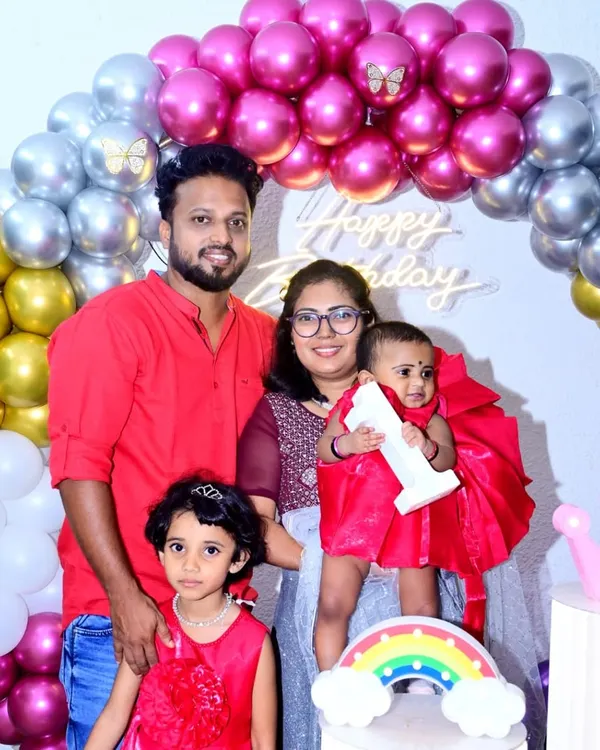 A beautiful family portrait is a must-have. I captured this family of four during their daughter's first birthday, ensuring a well-composed and happy memory for them to keep.