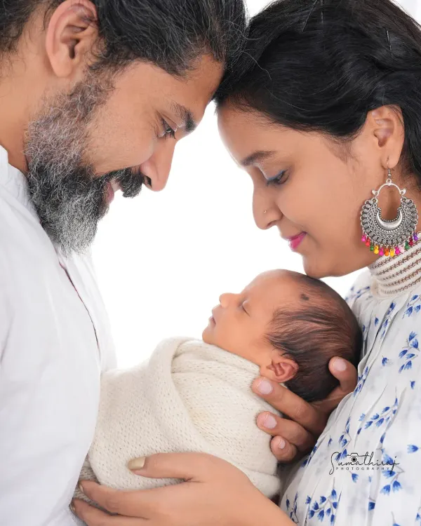 This is the portrait that captures the beginning of your new life as a family. I guide parents into a natural, loving pose that keeps the focus on the connection and the precious new baby in their arms.
