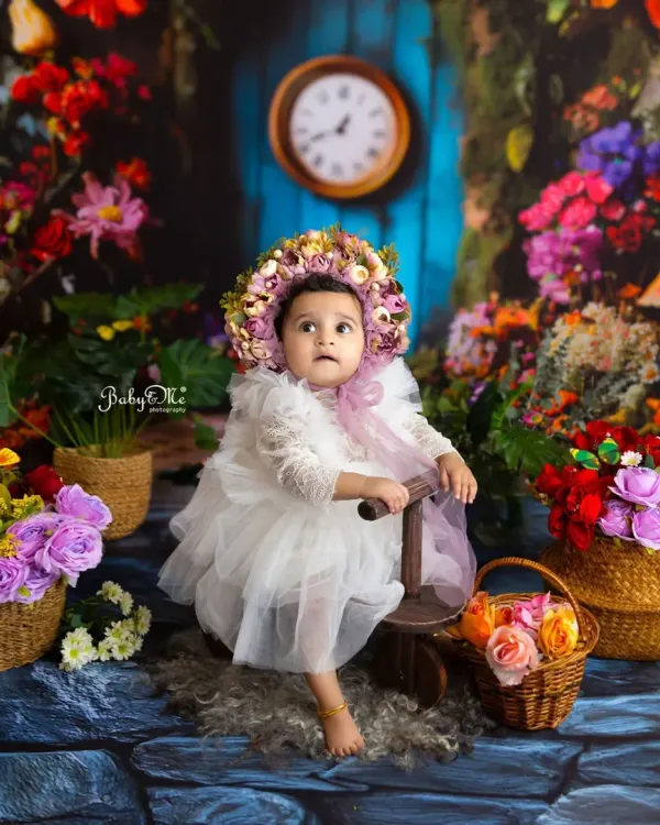 My heart is so full looking at this magical garden setup. This little fairy, with her beautiful floral crown and tulle dress, brought so much joy to the studio. These creative sitter sessions are perfect for capturing your baby's personality.