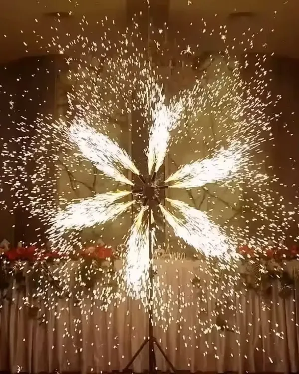 (Hero Item) I create stunning visual moments with effects like this rotating cold fire display. It's a safe, spark-based firework perfect for highlighting a stage, a grand entrance at a wedding, or a sangeet performance, ensuring a dramatic and memorable effect.