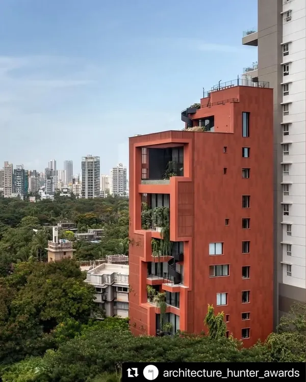 The award-winning Sarvasva tower stands as a testament to vertical living. We worked to integrate nature into its very fabric, creating a terracotta-clad structure that breathes amidst the concrete, with green spaces punctuating the facade.