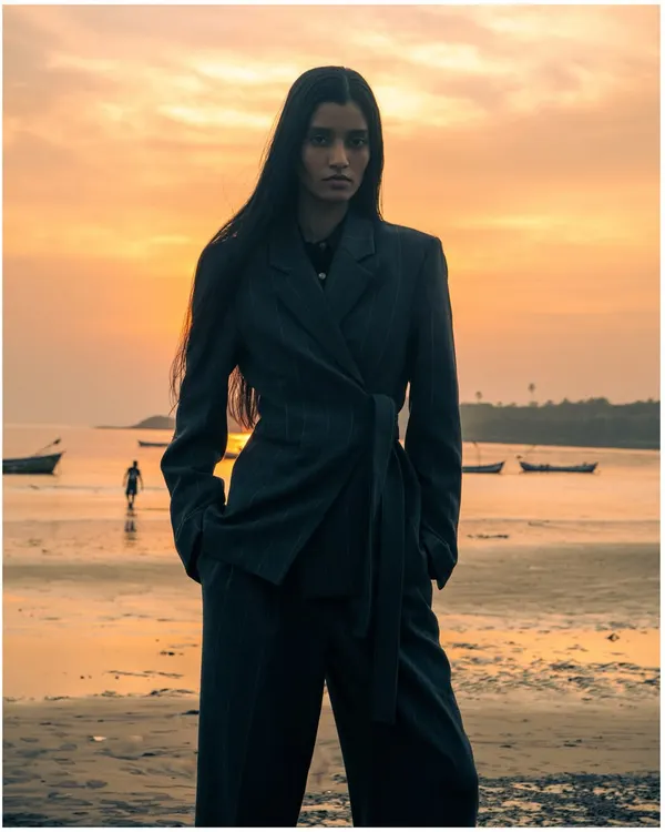 A powerful silhouette against the golden hour sunset. This shot captures the moody, atmospheric style I bring to my outdoor fashion editorials, blending strong poses with the beauty of the natural world.