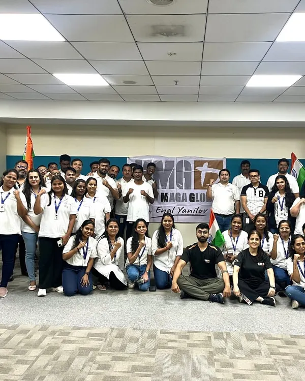 A large group of employees from a major Indian logistics organization after a self-defense workshop. Our training helps build team cohesion while teaching critical safety skills.