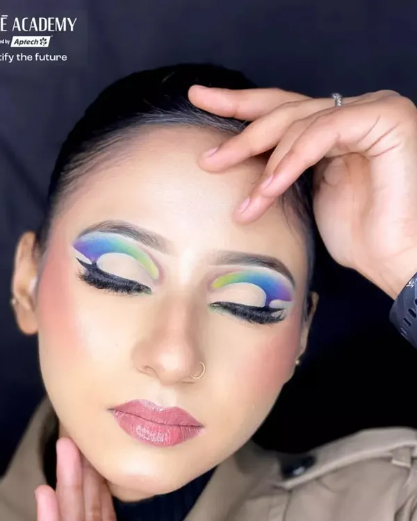 A stunning glam look created during one of our makeup classes. This features a colorful graphic eyeliner, demonstrating how to incorporate bold colors into a wearable, modern style.