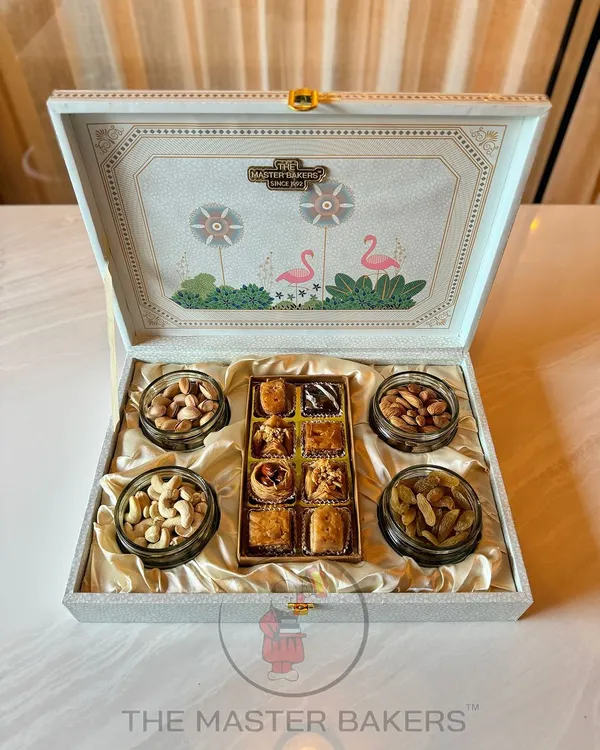 This premium gift box, filled with an assortment of Turkish Baklava and gourmet dry fruits, represents the luxury and attention to detail we put into every hamper. It’s a perfect example of how we blend traditional tastes with elegant presentation for Diwali and other special occasions.