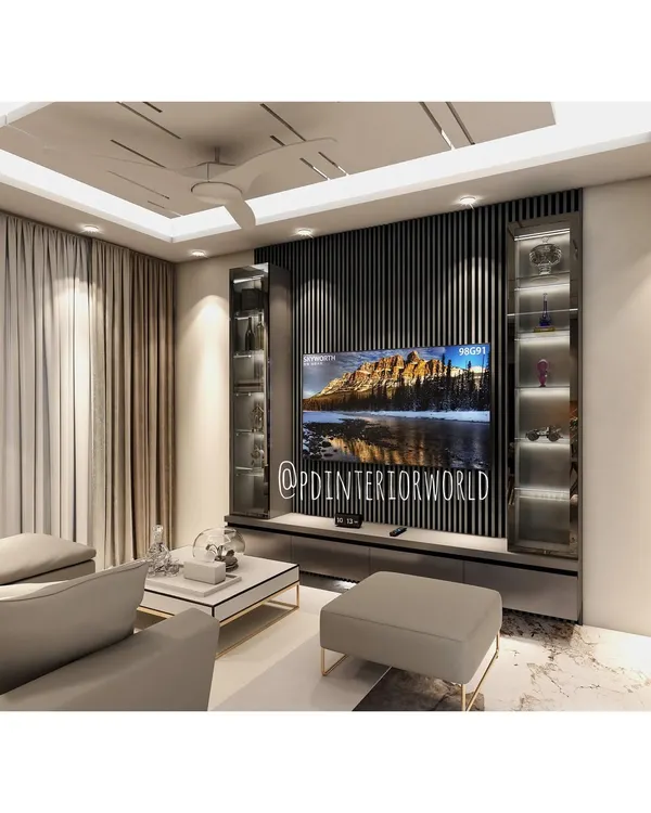 This is the kind of premium look we can create for your living room. This design features a floor-to-ceiling entertainment unit with dark fluted panels, a large TV space, and elegant glass display cabinets with internal lighting to showcase your decor.