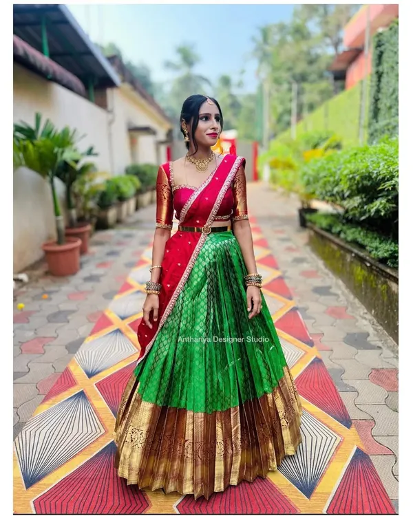 This is the magic I love to create. We took a beautiful traditional saree and transformed it into this vibrant red and green langa voni, perfect for making a grand entrance.