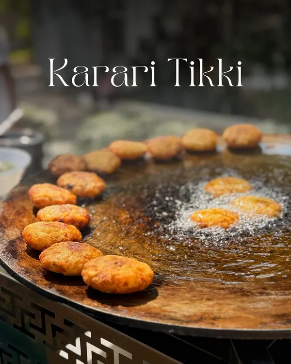 The heart of a great chaat is the tikki. Here are my Karari Aloo Tikkis sizzling on a large tawa, getting perfectly crisp and golden brown before being transformed into a delicious chaat.