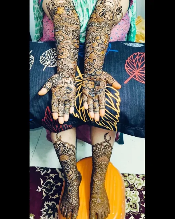 A complete bridal look for Feroz's sister, with beautiful, matching designs on both her hands and feet.