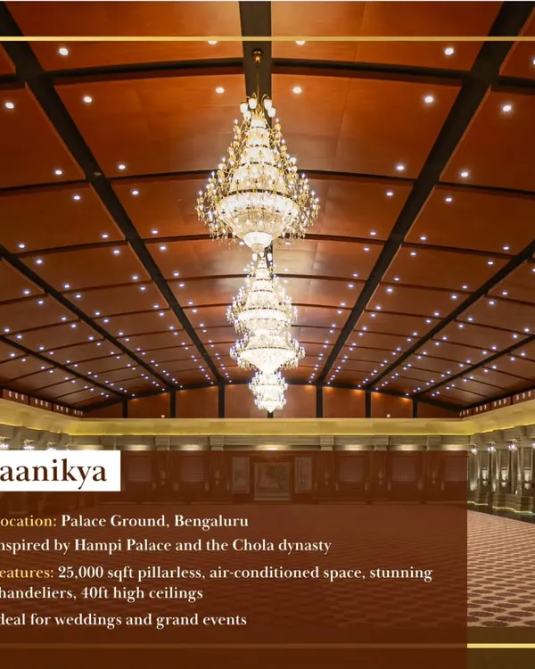 This is Maanikya, our 25,000 sqft pillar-less convention hall at Palace Ground. Inspired by the grandeur of Hampi architecture, its 40ft high ceilings and stunning chandeliers create an unforgettable setting for grand weddings and prestigious events.