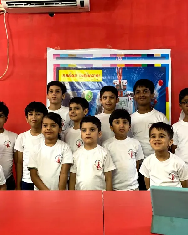 We are incredibly proud of our students who participated in a recent robotics competition. This photo captures the spirit of teamwork, focus, and accomplishment that we foster in all our programs, showing a group of young innovators ready to take on future challenges.
