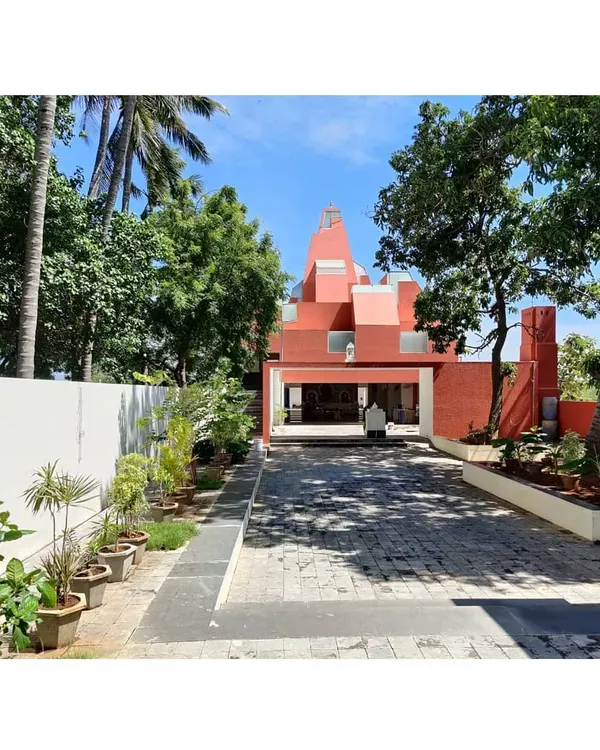 The entrance to the Sai Temple in Trichy, a project where we explored how to create a modern spiritual space. The design uses a ritualistic path, transitioning from light to dark and from open to enclosed, to guide the devotee towards the sanctum.