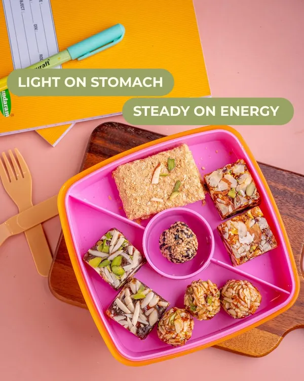 Tiffin time snacks that are light on the stomach and provide steady energy. This lunchbox is filled with my mom-approved sweets and barfis, keeping kids active and focused.