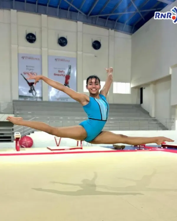 This is the moment where dedication meets artistry. We train our gymnasts to achieve peak physical condition, allowing them to perform breathtaking skills like this split leap with both power and grace.