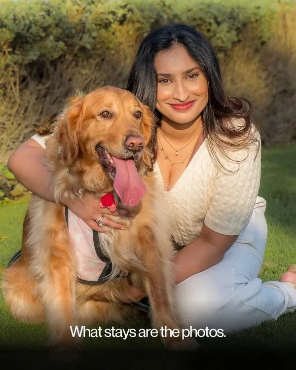 A quiet hug in the warm sun. This portrait of a woman and her golden retriever shows the simple, powerful connection that makes these sessions so meaningful.