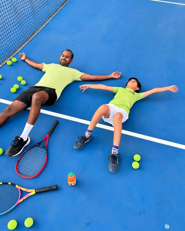 Summer vibes on the court. Taking a moment to relax and soak it all in after a great training session.