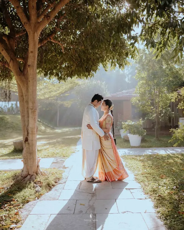 A quiet moment of connection between the couple, bathed in the soft morning light. I believe the most powerful stories are often told in the gentle, unspoken moments just like this one.