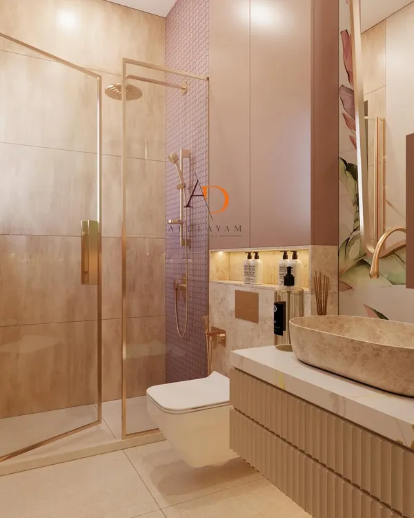 A view of a luxurious bathroom showing the glass shower enclosure with rose gold hardware and the elegant floating vanity.