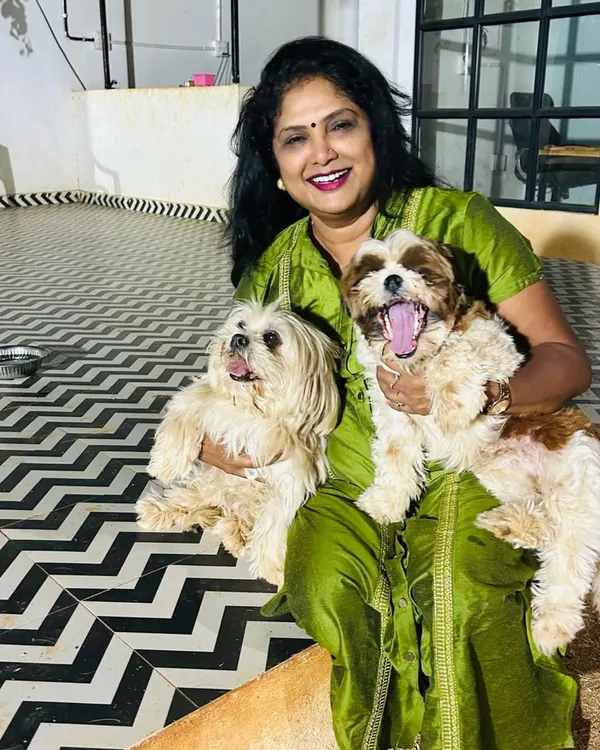 I believe every pet that walks through my door is a star, and my goal is to make them feel that way. Here I am with two of my adorable Shih Tzu clients, happy and relaxed after their grooming session.
