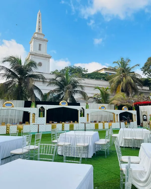A beautiful daytime setup at a prestigious venue, with my white and gold counters ready for an elegant garden wedding.