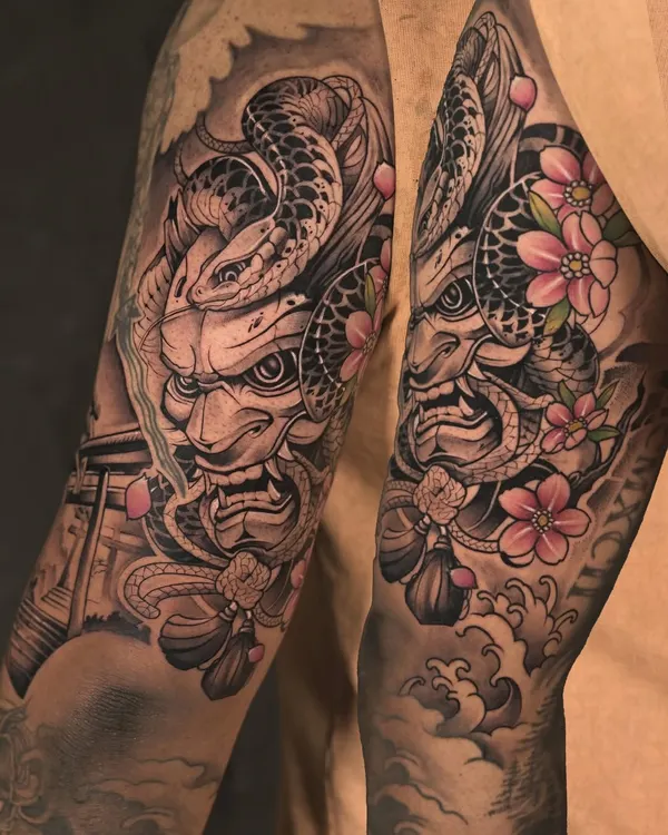 This Japanese-inspired sleeve is a testament to our dedication to storytelling through ink. We spent hours with our client to bring together the powerful symbols of the Hannya mask, the transformative snake, and the delicate sakura blossoms into a single, flowing narrative.