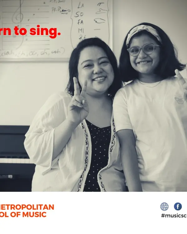 A happy moment between our Western Vocals instructor, Ms. Angelina, and her student. Our teachers are dedicated to making learning to sing an encouraging and rewarding experience.