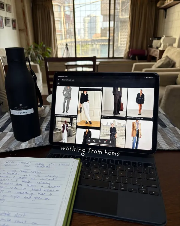 A peek into my work-from-home setup. This is where the magic begins, with mood boards, notes, and endless inspiration to create the perfect look for my clients.