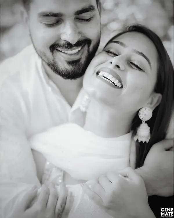 This black and white close-up is all about pure, uninhibited joy. Capturing this kind of genuine laughter is my ultimate goal, as it creates a timeless memory of happiness.