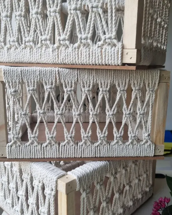 A stack of my multipurpose macrame baskets, ready to be used for gift hampers, home organization, or whatever you can imagine. The wooden frame provides great structure.