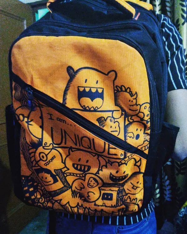 Here is the customized doodle backpack being worn. It's a fun way to make an everyday item a unique piece of wearable art.