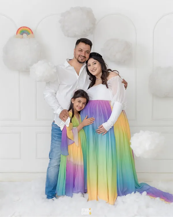 This is what it looks like when a mother's dream comes to life. We built this magical rainbow-themed set from scratch to celebrate their rainbow baby on the way, creating a vibrant, loving world as special as the family in it.
