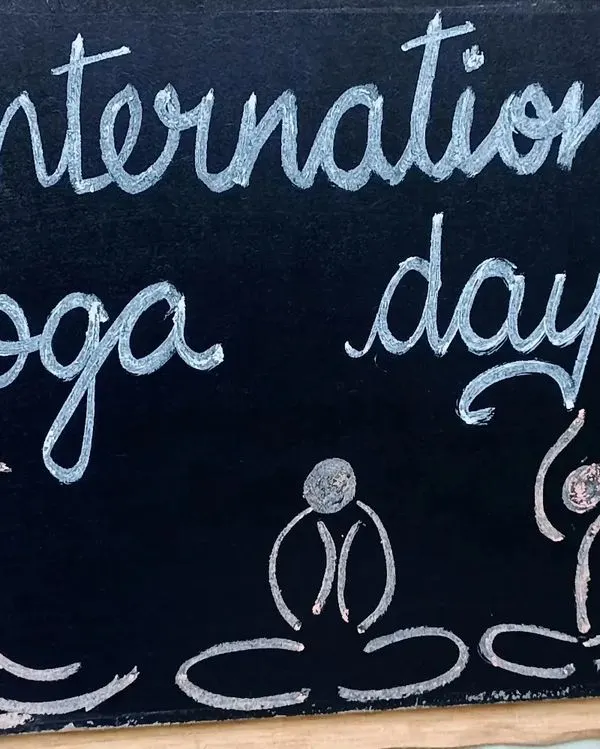 Our chalkboard announcement for International Yoga Day.