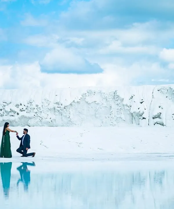 A proposal against a surreal, snow-like landscape. We specialize in finding unique locations for pre-wedding shoots that result in breathtaking, once in a lifetime images like this.
