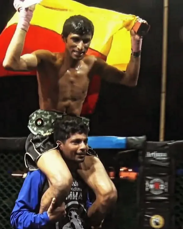 This is what victory feels like. A knockout win, the roar of the crowd, and your coach lifting you up as you fly the flag for our team. This is the moment we train for.