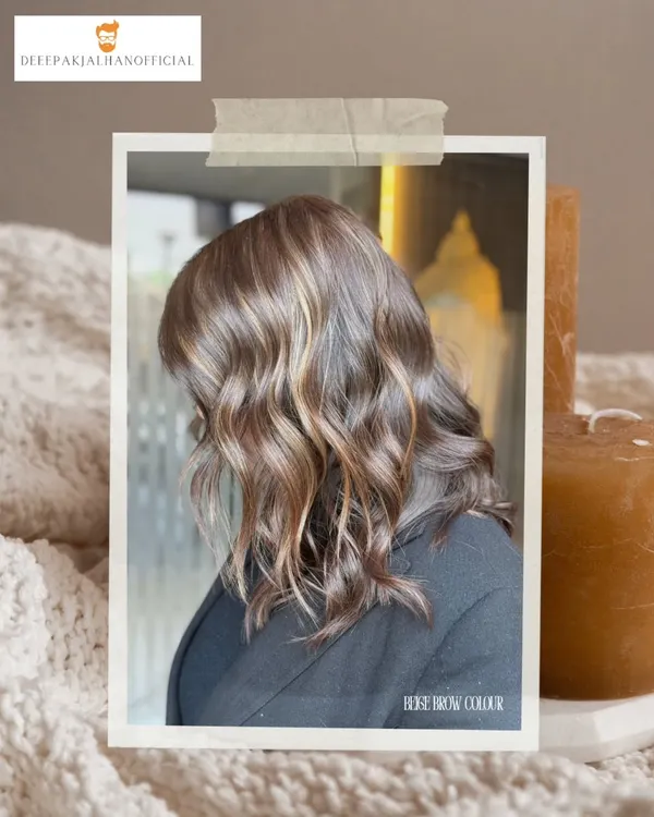 A perfect example of a beige brown balayage. The soft waves showcase the seamless blend of warm and elegant tones, adding depth and shine.