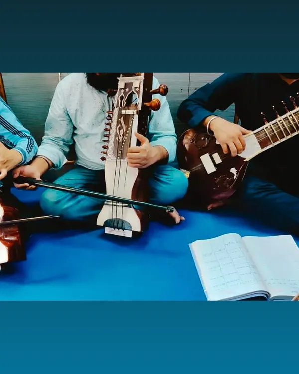 We believe in the power of ensemble music. Here, our students are practicing with a Dilruba, Sarangi, and Sitar, demonstrating the beautiful harmony our various string instruments can create together.