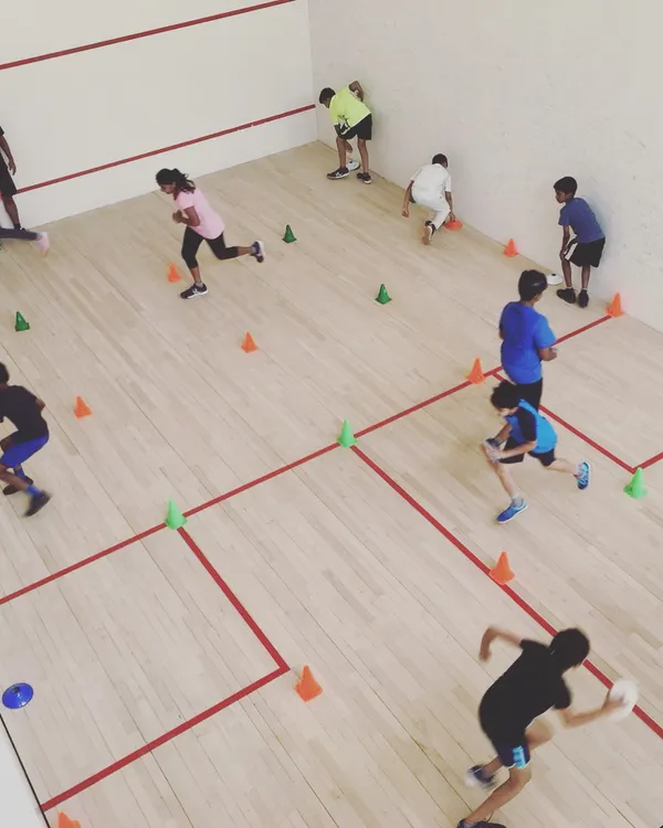 Welcome to our Squash Summer Camp. This is where the action happens, with dynamic group drills designed to be as fun as they are effective. We get everyone moving, learning, and pushing their limits together on the court.